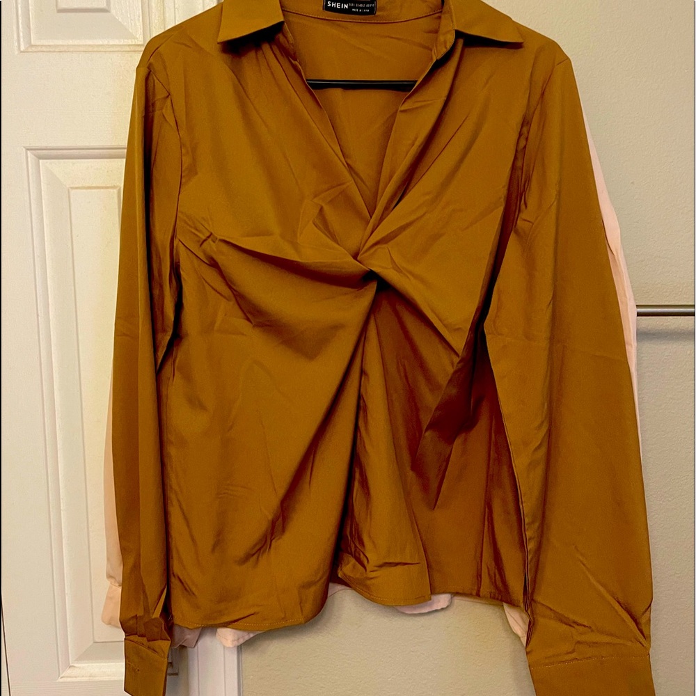 Women casual button down top. Super cute my torso is just to long.